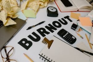 Desk with Burnout written on it.